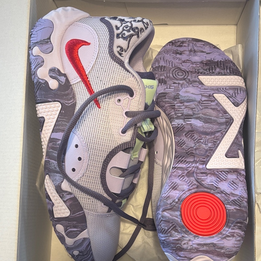 Nike Gray and Red Sneakers with Patterned Sole